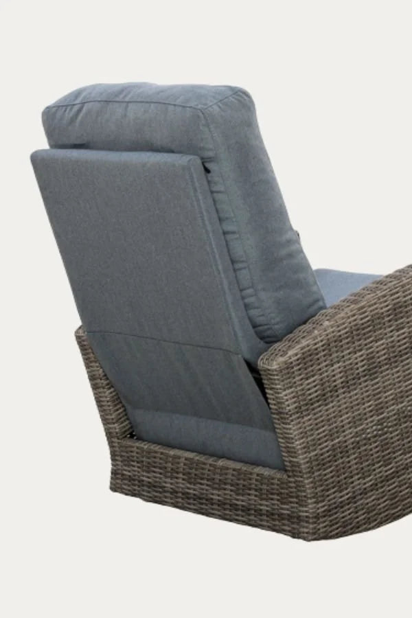 Wicker armchair showing the built-in all-weather cushion cover, back cushion detail